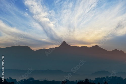 As the Sun rises over Sri Lanka, the view of Sri Pada or Adam's Peak mountain can be seen across the entire island nation