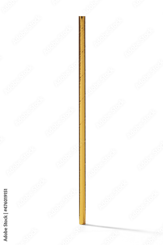 Detailed shot of a paper sparkling golden straw. The shiny cocktail straw is isolated on the white background.