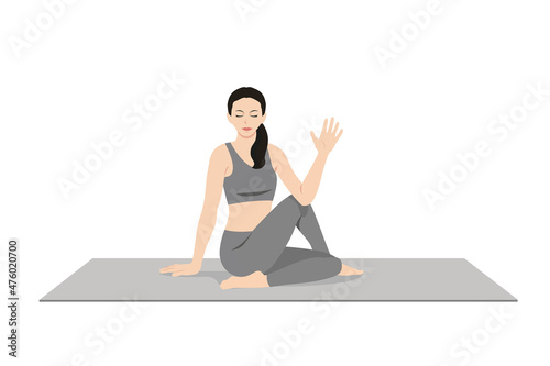 Half Lord of the Fishes Pose, Baddha Ardha Matsyendrasana, Bound Half Lord of the Fishes Pose. Beautiful girl practice Ardha Matsyendrasana, Matsyendrasana. Young attractive woman practicing yoga photo