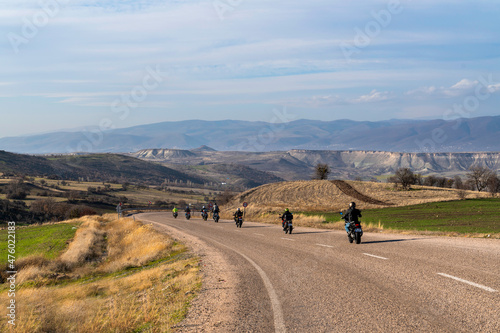 Ankara, Turkey - December 12 2021: Classic bikers ride on an asphalt road for an event. © Bilal