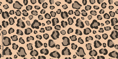 Seamless leopard or cheetah print. Animal fur texture. Camouflage design paper