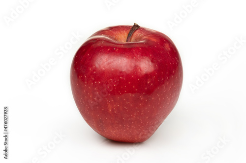 Whole red ripe apple isolated on white background