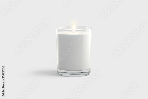 Fotografie, Obraz Blank white pillar candle in glass jar mockup, gray background