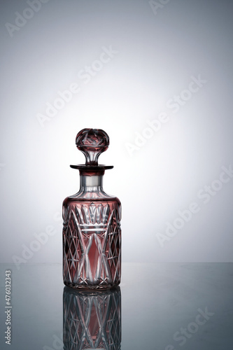 A beautiful glass bottle for perfumery. Bohemian crystal. Close-up. Copyspace