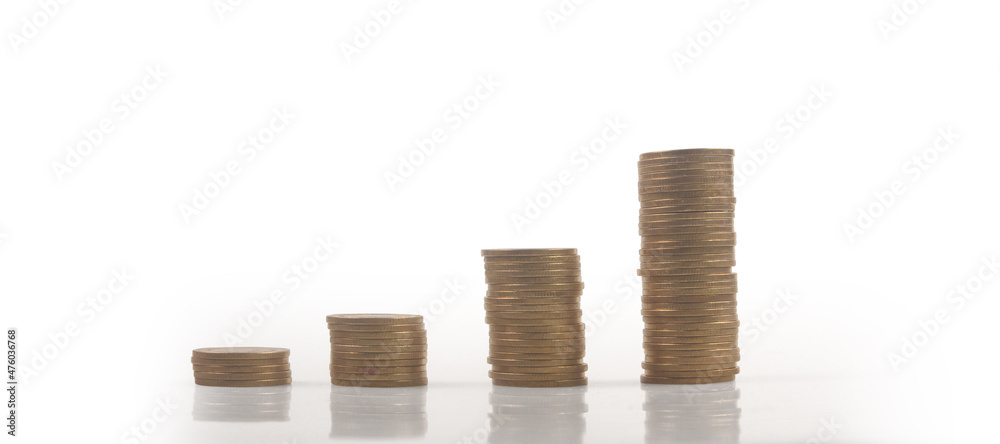 Stack of coin with trading graph, financial investment