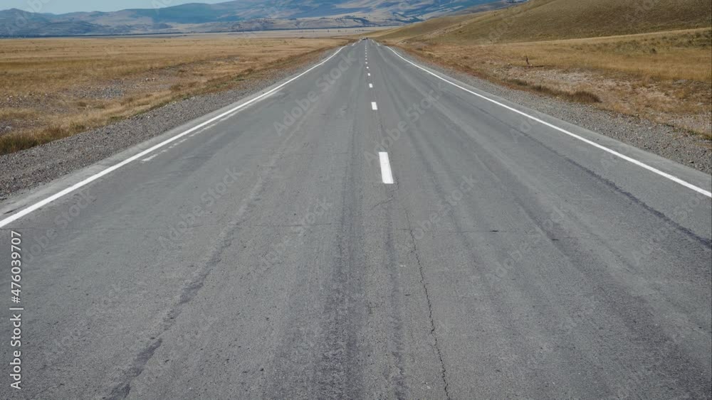 Road Goes Into Distance To Mountains In Prairie Road Goes Into Distance To Mountains In Prairie