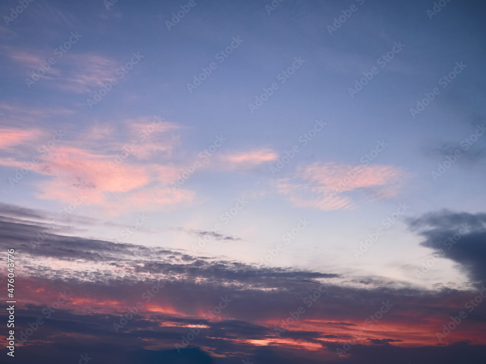 The sky is at sunset, the setting sun beautifully highlights the clouds, a natural abstraction
