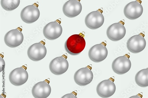 Red and silver shiny Christmas baubles on a pastel background. Christmas decorations.