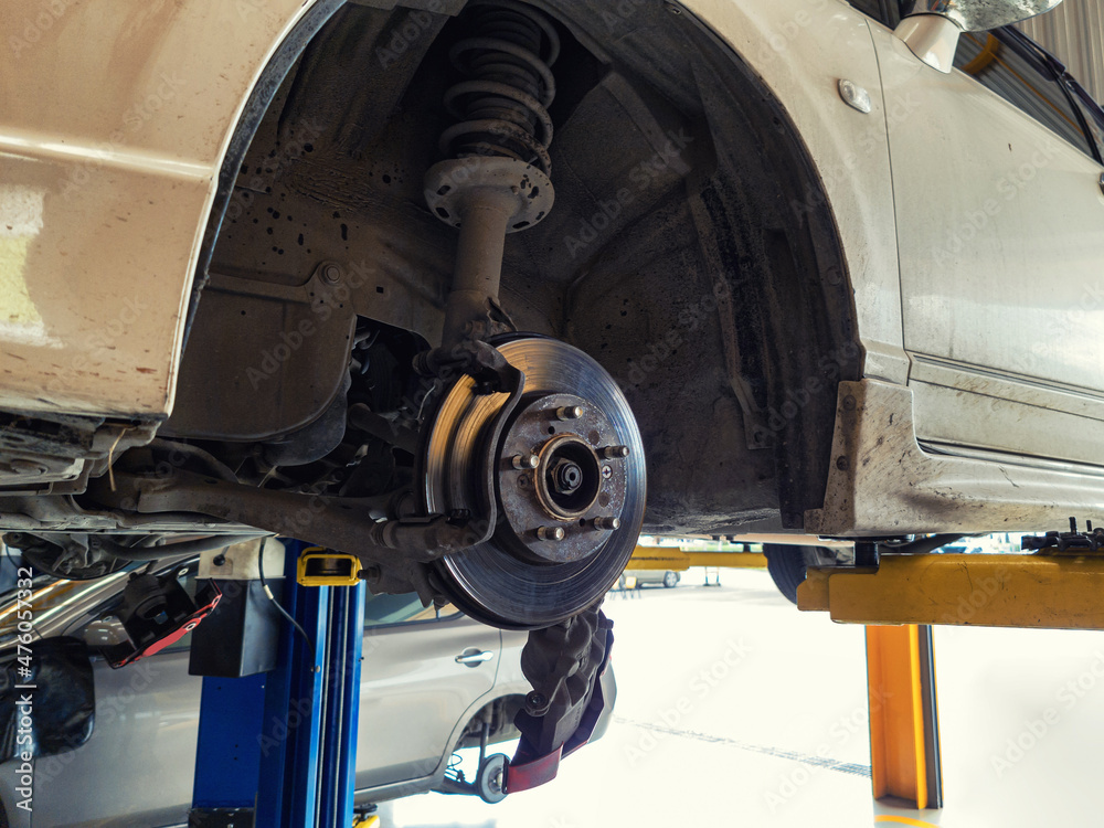 custom made wallpaper toronto digitalDamaged car and dirty disc brake lifting for maintenance in workshop