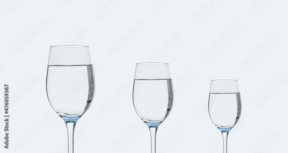 Three glasses of clean drinking water on a white background. Three glasses of clean drinking water on a white background.
