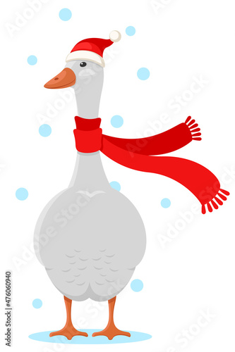 Christmas goose in a hat and scarf. Merry christmas and new year