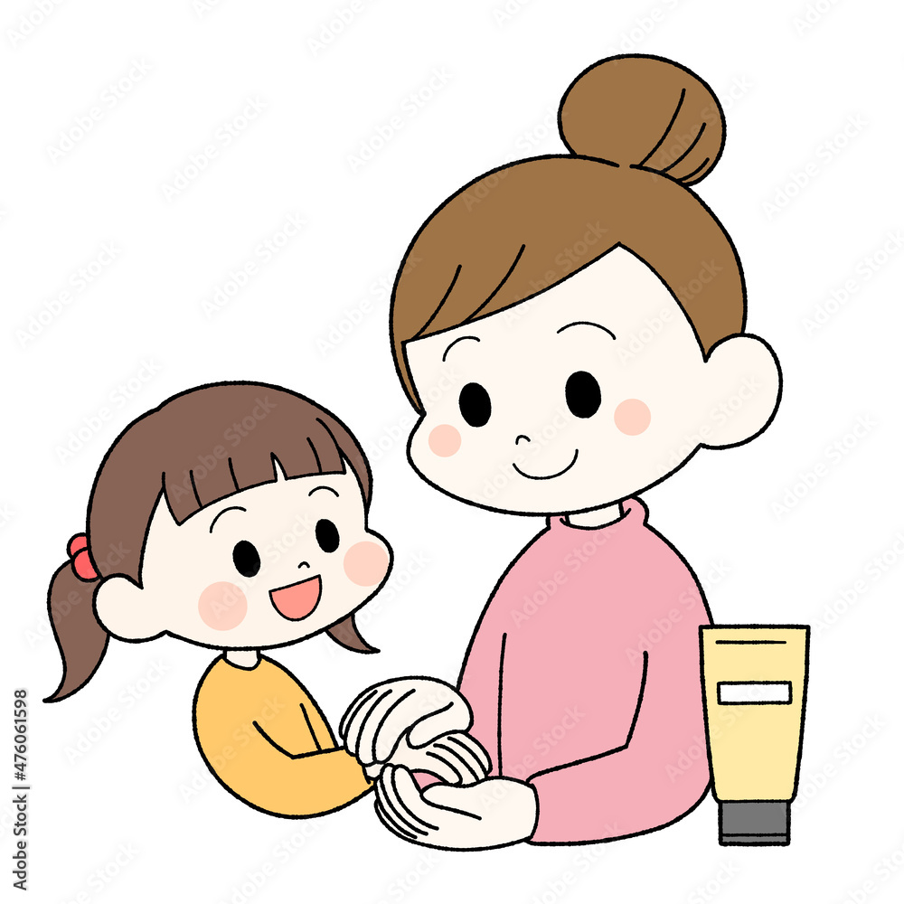 子供にハンドクリームを塗ってあげる母親 子供にハンドクリームを塗ってあげる母親