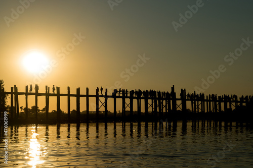 U Bein Bridge  Amarapura  Myanmar - view of this famous bridge during the sunset at Taung Tha Man Lake