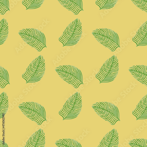 Organic palm leaf seamless pattern with hand drawn foliage print. Simple color background. Vector illustration for seasonal textile.