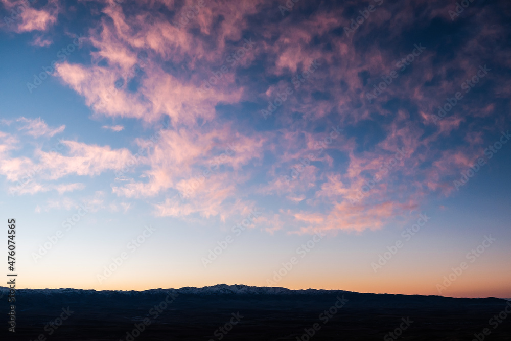 Beautiful sunset clouds in pink colors. Abstract nature background