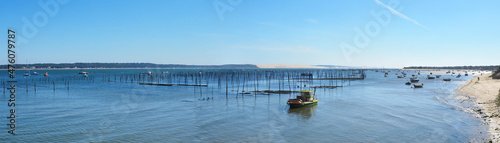 Panoramic view of the dune du Pilat and the oyster beds of Lége-Cap Ferret on the Arcachon basin, in Nouvelle-Aquitaine, in the south-west of France photo