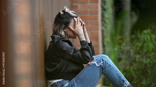 Woman feeling regret covering face with hand ashamed