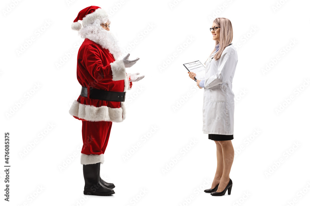 Full length profile shot of santa claus talking to a young female doctor Full length profile shot of santa claus talking to a young female doctor