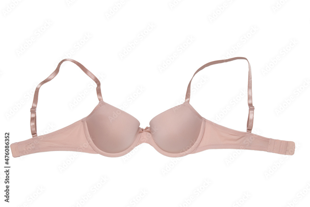 Bra isolated. Closeup of beautiful female stylish flesh colored brassiere with straps isolated on a white background. Fashionable sexy women underwear. Bra isolated. Closeup of beautiful female stylish flesh colored brassiere with straps isolated on a white background. Fashionable sexy women underwear.