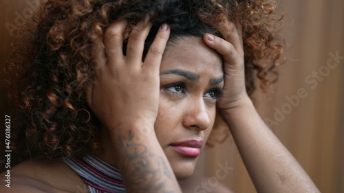 Black Brazilian woman with despair and desperate expression