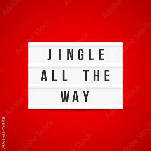 Christmas quote on a light box letter sign with red background: Jingle all the way.