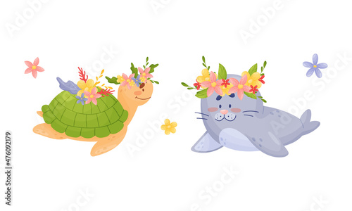 Sea animals in wreath of flowers set. Cute turtle and seal marine baby creatures with flowers vector illustration