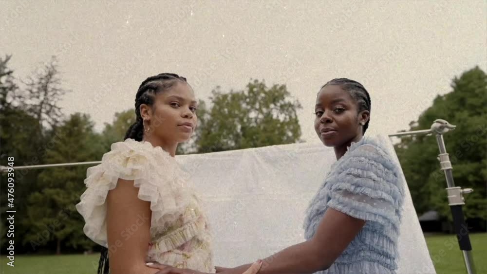 Black Models with Cornrows in Open Field Black Models with Cornrows in Open Field