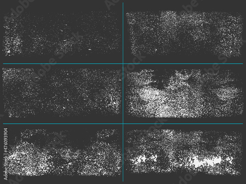 Subtle gritty textures. Rough grit design elements. Distressed dirty vector graphic on dark background.