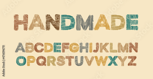 HANDMADE lettering in colored letters and the English alphabet with a textile texture. Stylish and creative fabric font design. Vector set of capital Latin letters in retro style on light background