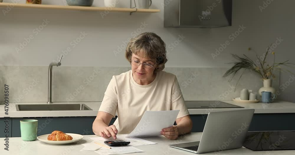 Tired woman retiree work with financial papers calculate sum of money to pay for housing feel nervous think on mistake debt budget deficit. Worried old lady read loan documents unable to make payment