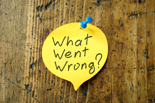 Memo stick with phrase What went wrong. photo