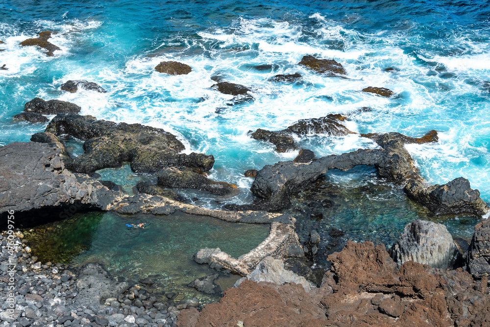 Rocky beach and crystal clear water on El Hierro island. Canary Islands.