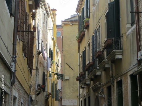 VENICE, ITALY - 2018. A narrow passage between the walls of the old city.