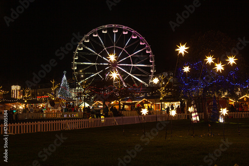Christmas market with ferris wheel in the night in Galway