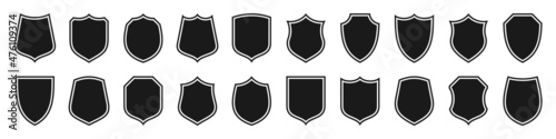 Set of various vintage shield icons. Black outlined heraldic shields. Protection and security symbol, label. Vector illustration.