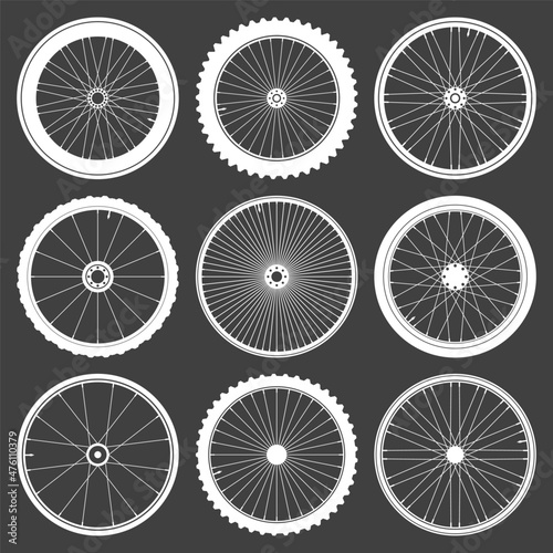 White bicycle wheel symbols collection. Bike rubber tyre silhouettes. Fitness cycle, road and mountain bike. Vector illustration.