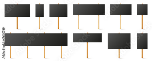 Foto Blank black protest signs with wooden holder