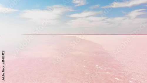 Aerial rising view close up pink Tuz salt lake in Turkey . Tuz golu panoramic landscape in central anatolia photo