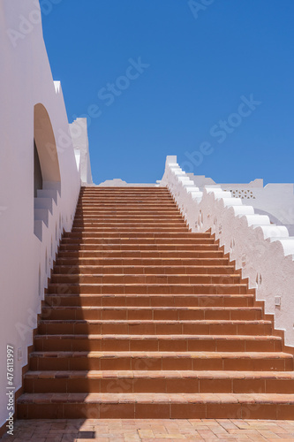 Detail of stairs and white wall of a house on the street of Egypt in Sharm El Sheikh © OlegD