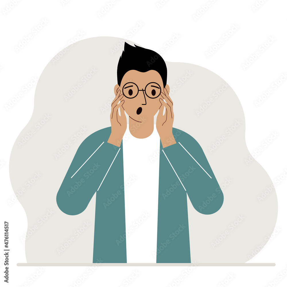 The unhappy man screams, clutching his head with his hands. Emotions and body language concept. Stress, tension and migraine concept. The unhappy man screams, clutching his head with his hands. Emotions and body language concept. Stress, tension and migraine concept.