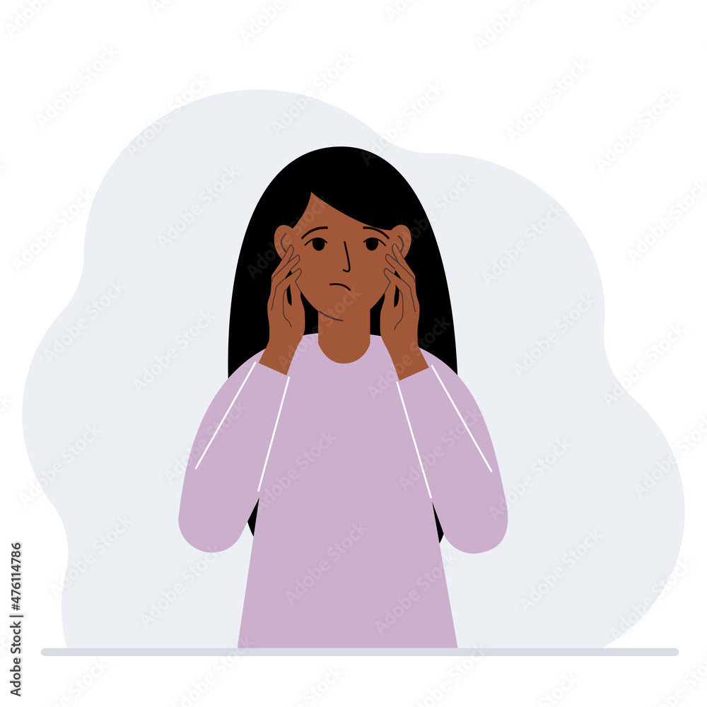 Unhappy woman clutching his head with his hands. Emotions and body language concept. Stress, tension and migraine concept. Unhappy woman clutching his head with his hands. Emotions and body language concept. Stress, tension and migraine concept.