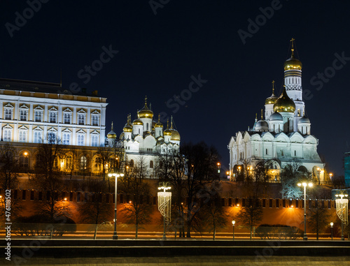 Moscow, Russia, Dec 09, 2021: Night view of Kremlevskaya embankment. The Kremlin: temples, bell tower, wall. Winter. December