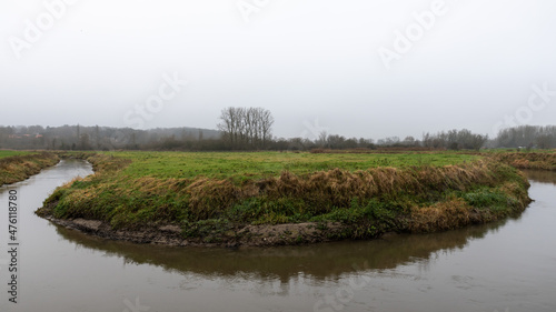 The river Dyle meandering through the Flemish countryside photo