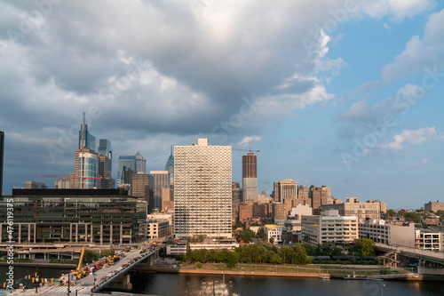 Aerial panoramic city view of Philadelphia financial downtown  Pennsylvania  USA. Chestnut Street Bridge over Schuylkill River at summer sunset. The economic and cultural vibrant neighborhood