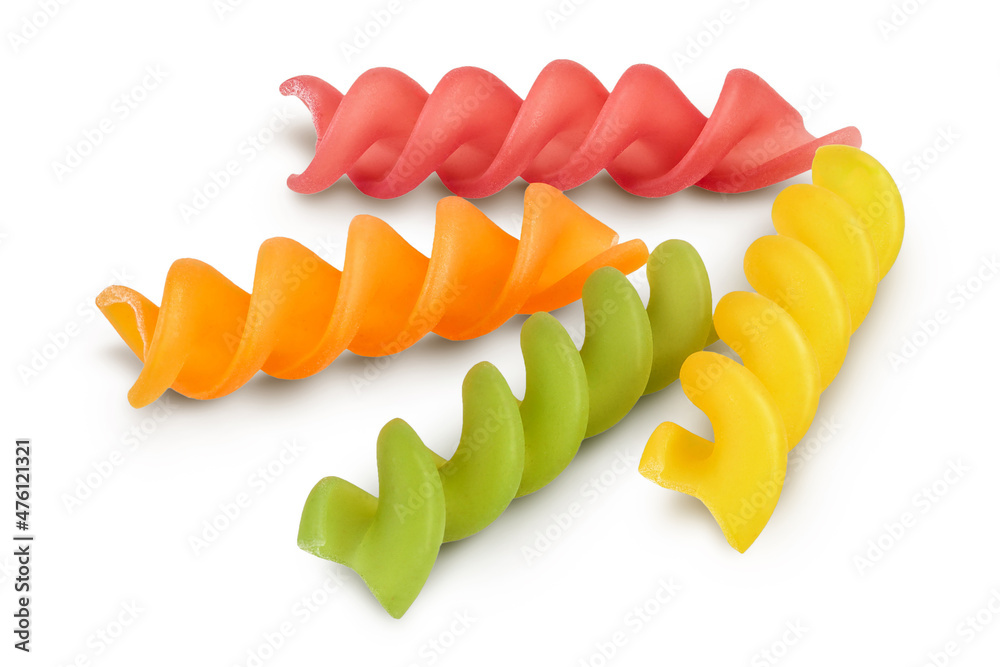 raw Fusilli colored pasta, isolated on white background with clipping path and full depth of field
