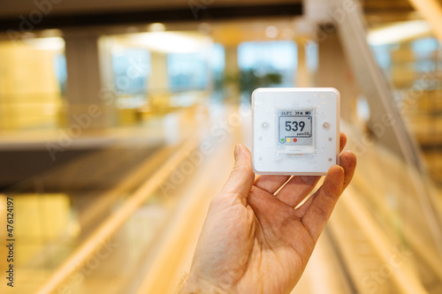 Air quality sensor CO₂ sensor monitor Indoor. Healthy work environment. Work from home. Control proper ventilation in your levels airflow in the room. Carbon dioxide levels and airflow. Smart home