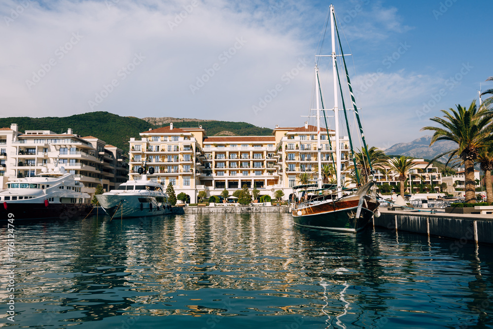 Sailing yachts at the marina of the Regent Hotel in Porto. Montenegro