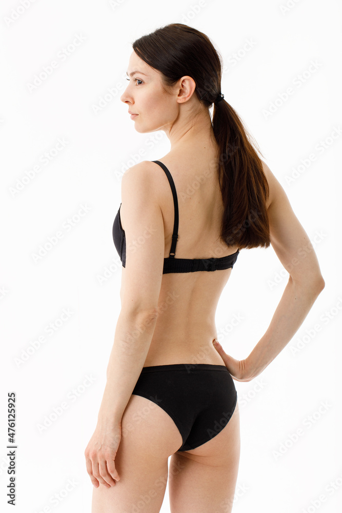 Model tests. Snap Models back view, Beautiful brunette woman in underwear, isolated on white. Model tests. Snap Models back view, Beautiful brunette woman in underwear, isolated on white.