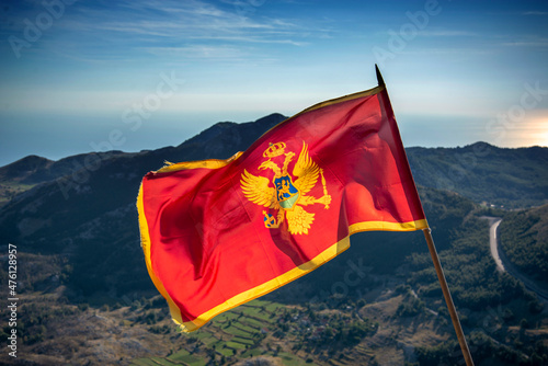 National flag of Montenegro,on the summit of Mount Lovcen,Montenegro,Eastern Europe.