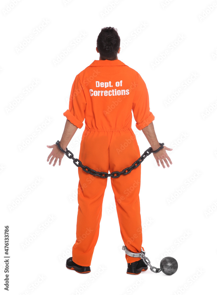 Prisoner in jumpsuit with chained hands and metal ball on white background, back view Prisoner in jumpsuit with chained hands and metal ball on white background, back view